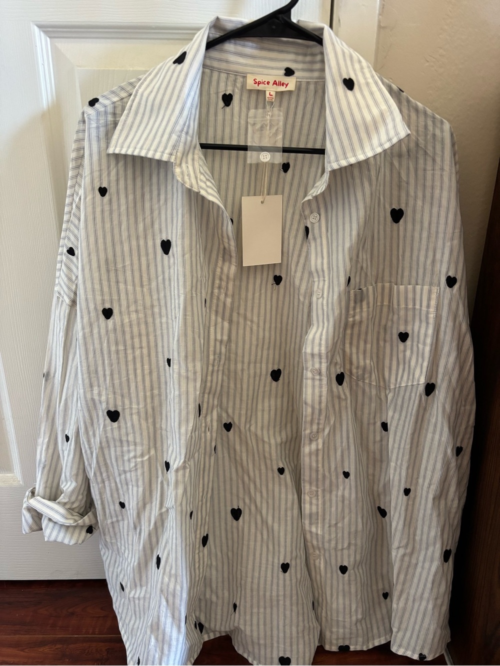 Women’s striped shirt with embroidered hearts
